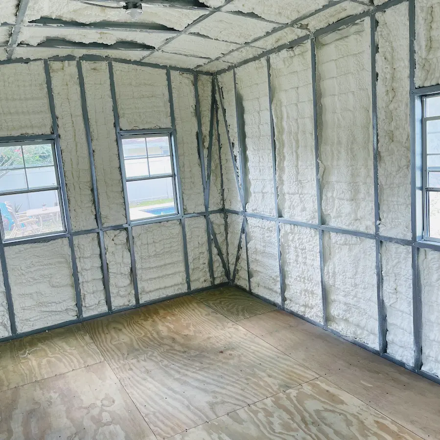 Closed-cell spray foam insulation applied to wall cavities in a residential project in Hartford
